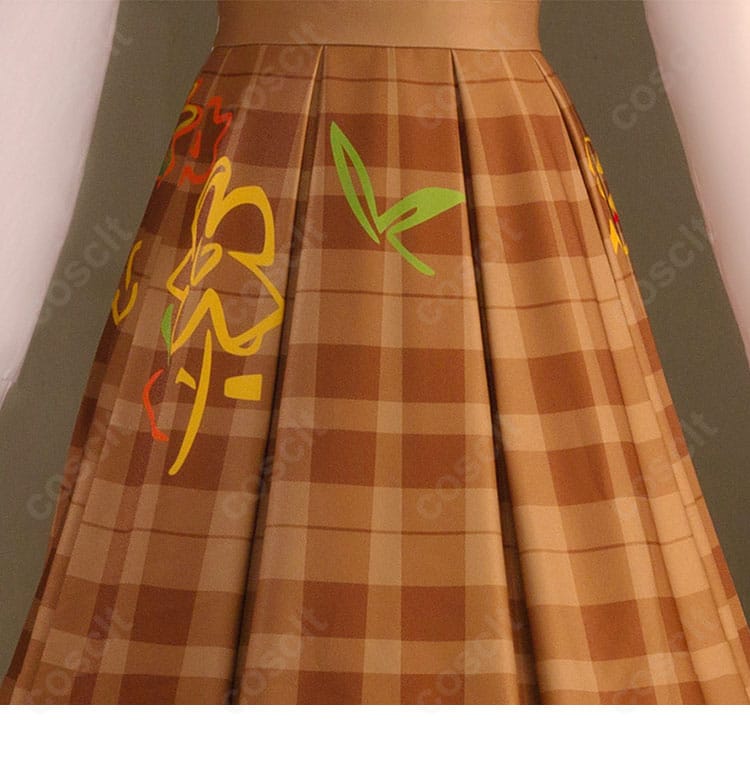 スカート部分の装飾ディテール。秋色トーンとクラシックなテクスチャが華やか