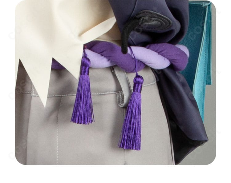 腰紐・流蘇ディテール：特徴的な腰紐と揺れる流蘇が分かるクローズアップ