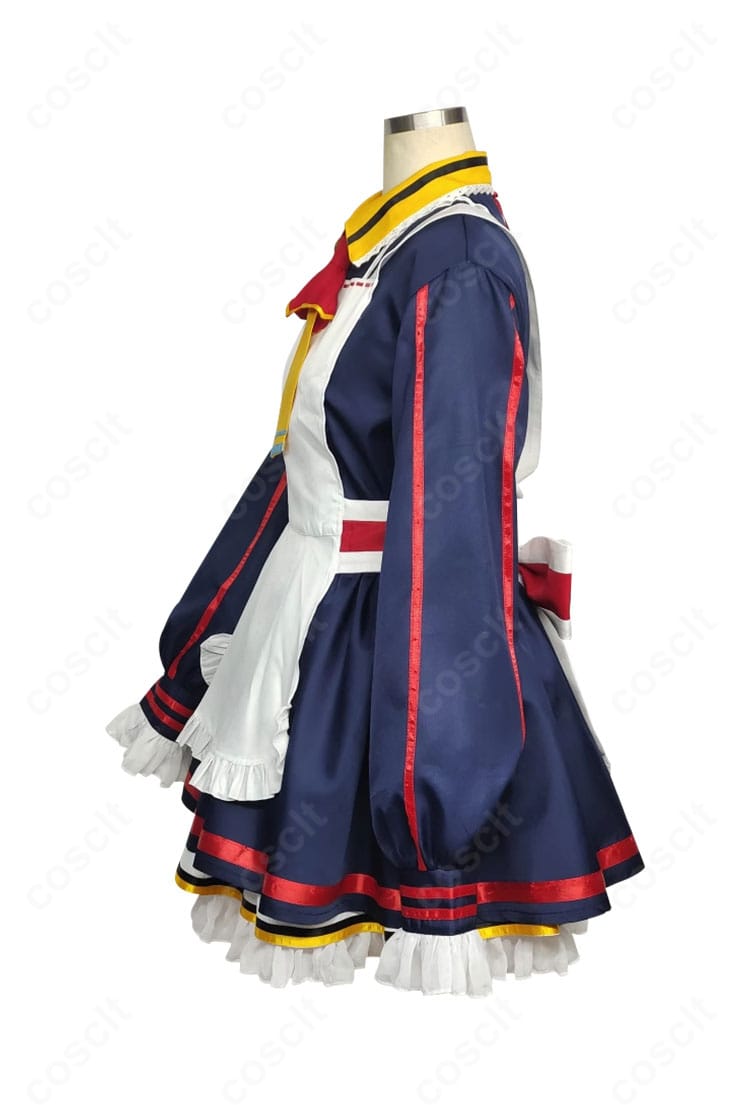 左側装飾のクローズアップ。刺繍パーツと縁取り、エプロンのステッチワークを確認できるディテール写真。