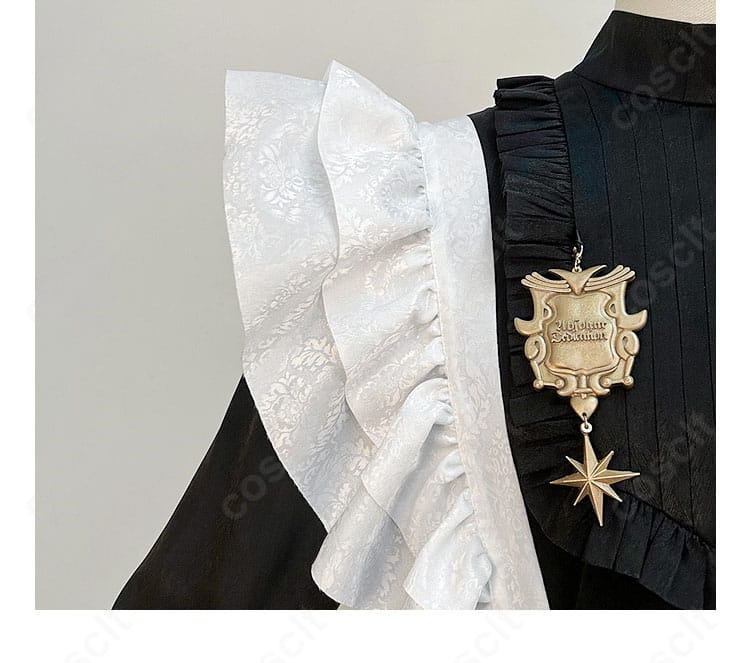 肩袖の装飾ディテール。フリル重なりと縫製ラインの整いを示す