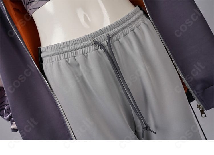 パンツウエストのディテール。ベルトラインとステッチワークの近接写真。