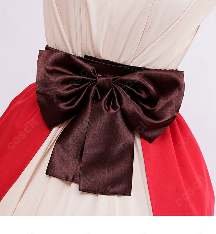 ウエストの蝶モチーフ装飾の詳細。立体的な結び目と中心の飾りでアクセントを付けた意匠。