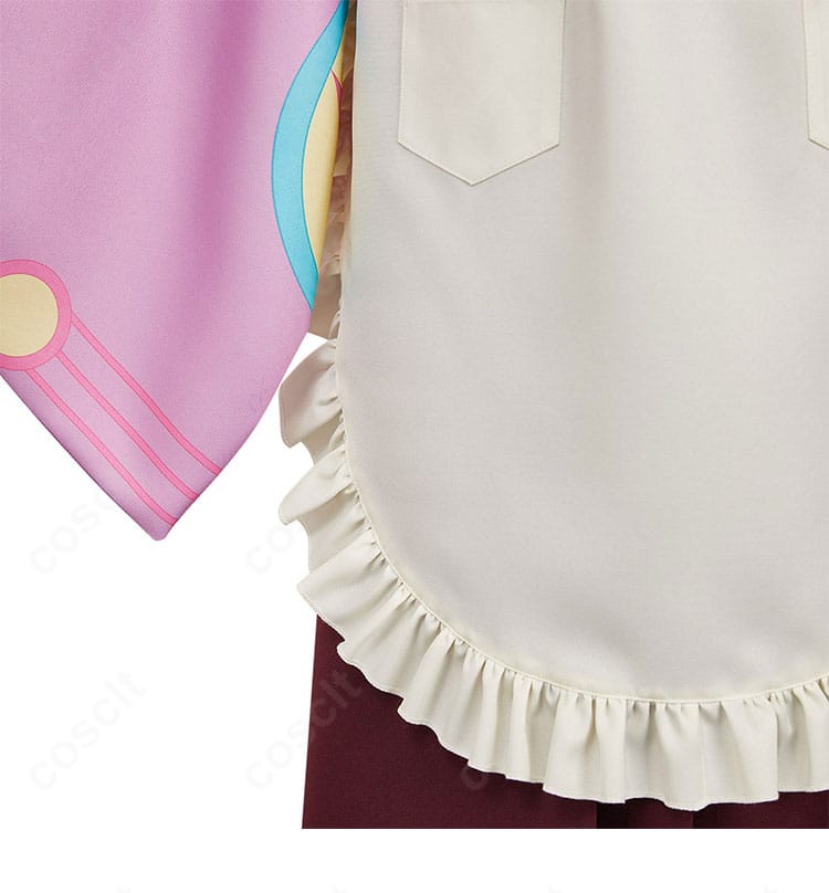 エプロンの装飾ディテール。ステッチワークと縁取り、着物との色調バランスを確認できる画像。