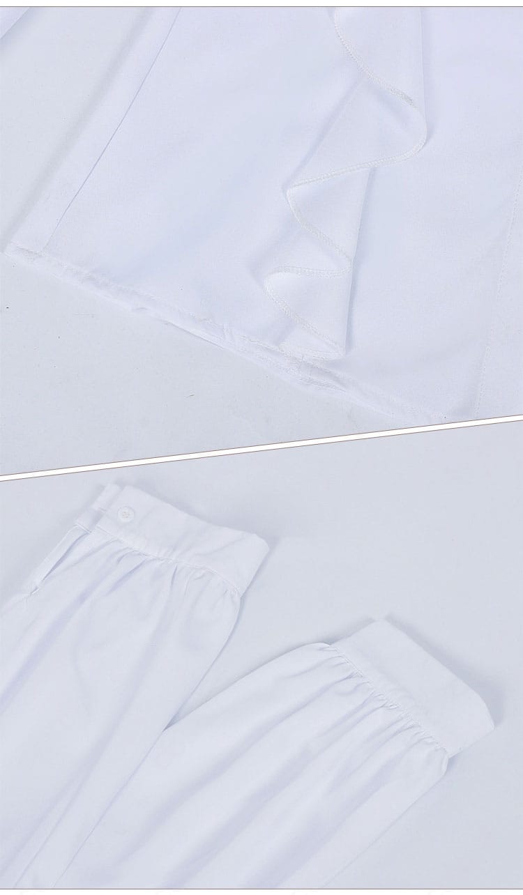 シャツの裾と袖の接写。袖口の装飾とカフの形状、裾の始末が分かるディテールカット。