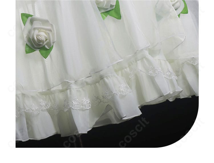 フリーレン白ドレスのスカート裾装飾クローズアップ。華やかな縁取りと揺れ感が特徴。