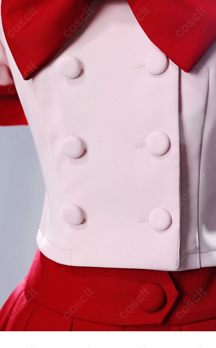 襟元（門襟）の装飾詳細。ぴちぴちピッチの制服らしい清楚なデザインと蝶結びの位置関係が分かる画像