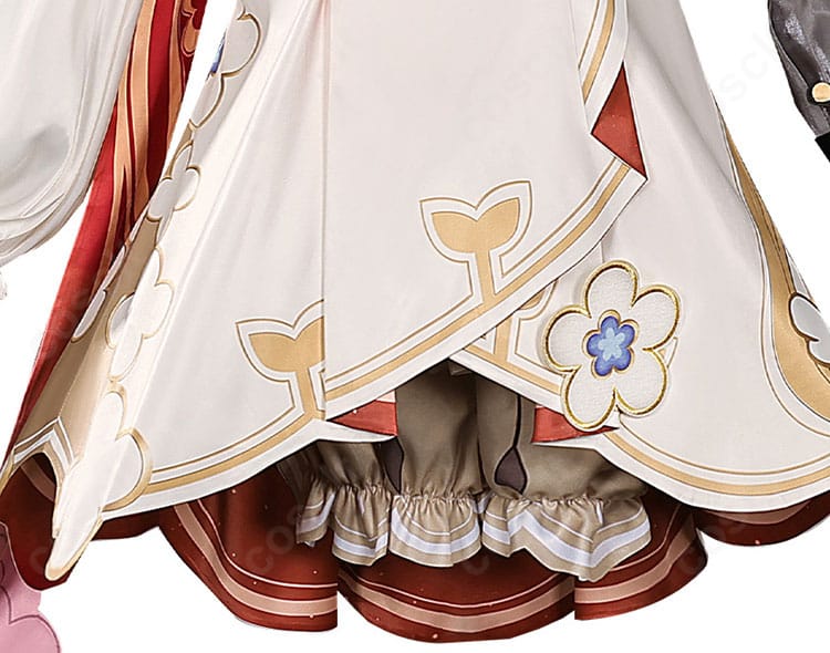 裾装飾のクローズアップ。動きに合わせて映えるデザインで、美しさと機動性を両立したトリビー衣装。