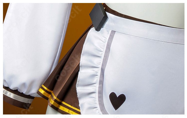 スカートとエプロンの装飾ディテール。レイヤー構成と縁取りの美しさを示す。