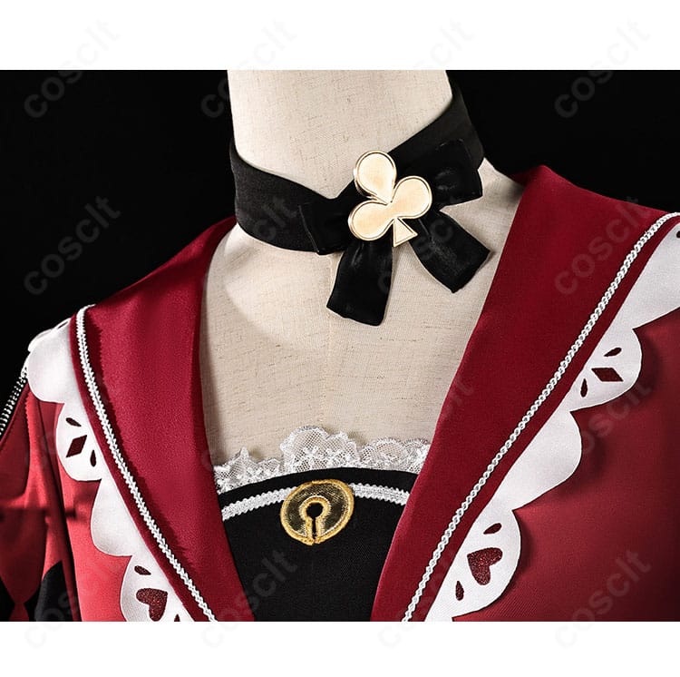 ネック・リボン飾りのアップ。結び目と装飾パーツの質感・形状がわかるディテール写真。