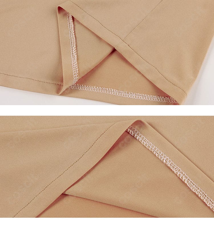 コート裾のディテール。直線的なラインと生地のハリ感を確認できるカット