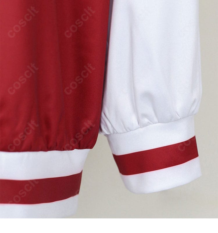 明導アキナ トップスの袖ディテール画像（袖口デザインと配色アクセント）