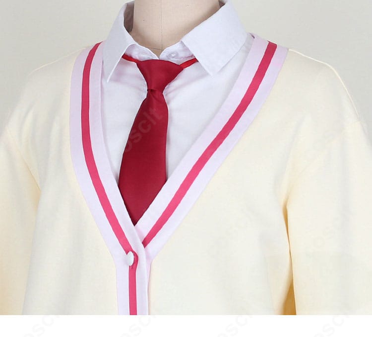 襟元とネクタイの装飾ディテール。結び目のボリュームとステッチの丁寧さを強調。