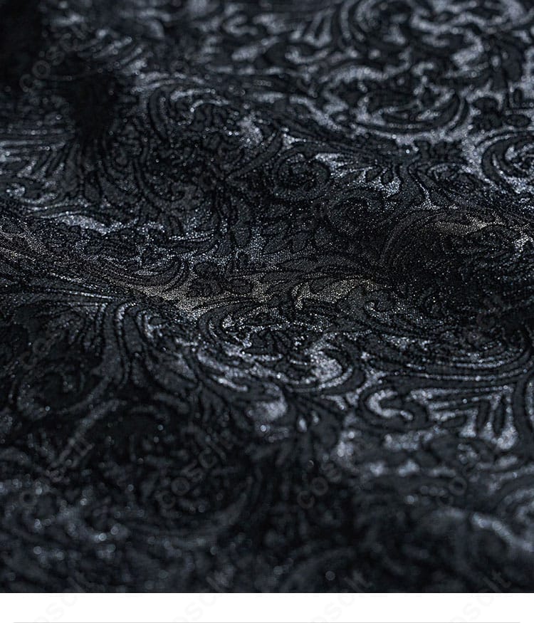 生地のテクスチャと装飾ステッチの近接写真。ゴシックな濃色と縁取りの質感表現。