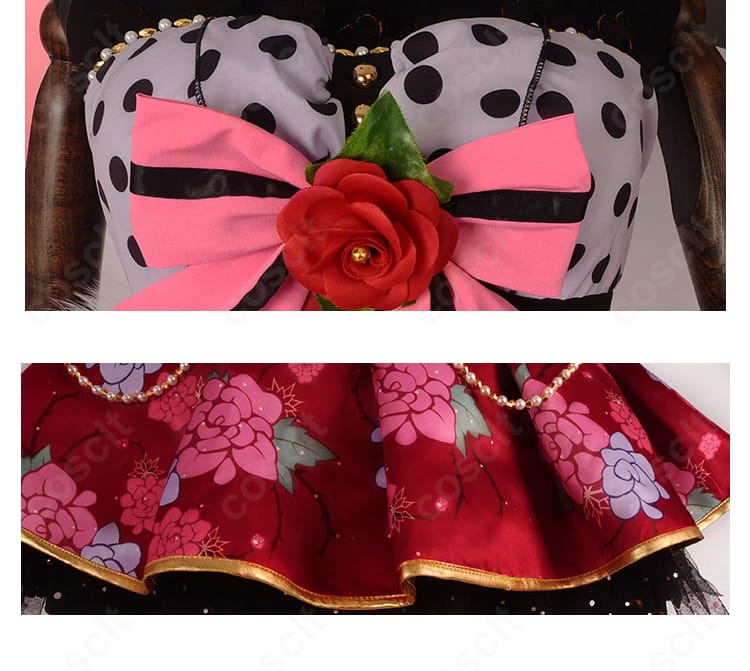 胸元の蝶モチーフとスカート装飾のアップ。華やかな小悪魔テイストのアクセントが映えるディテール写真