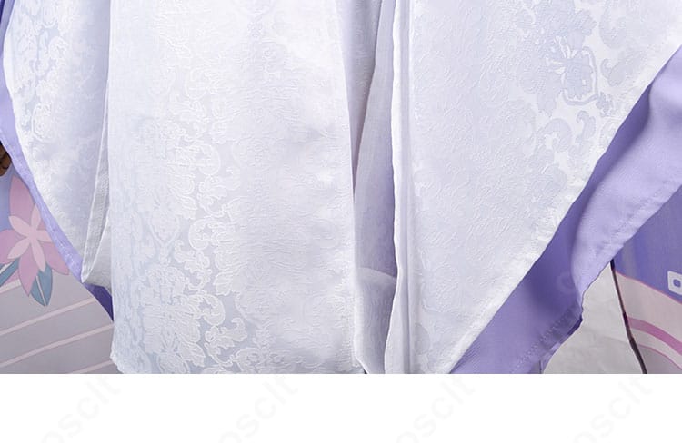 衣裾と襟の装飾ディテール。縁取りの仕上げと配色で高級感を表現。