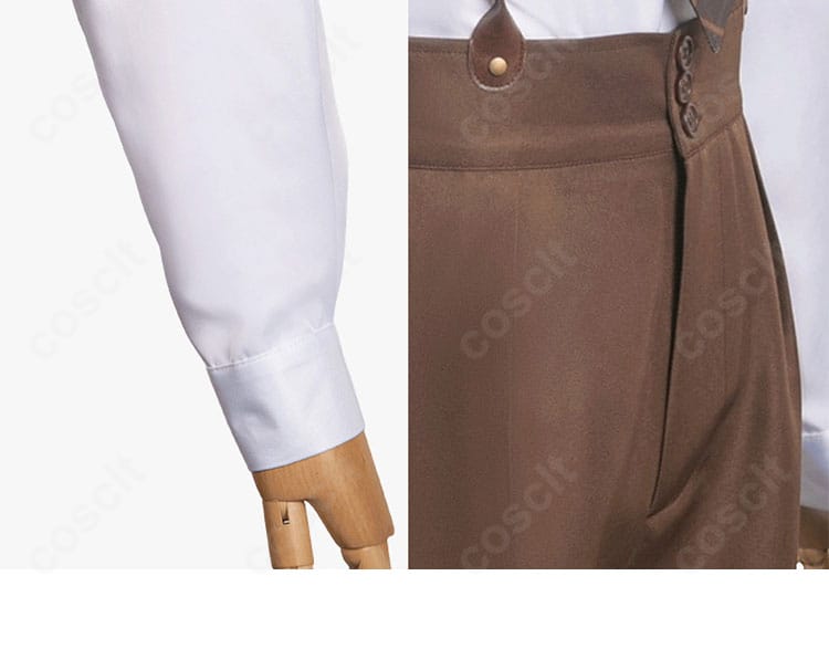 ズボンと袖口の装飾ディテール。生地のハリ感と縫製ラインの精密さが際立つカット。