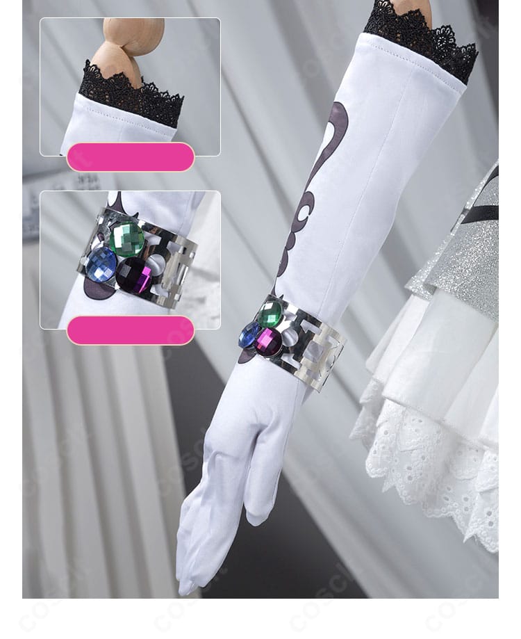 手袋とブレスレットのディテール。手元の装飾と縫製の仕上げを示す接写