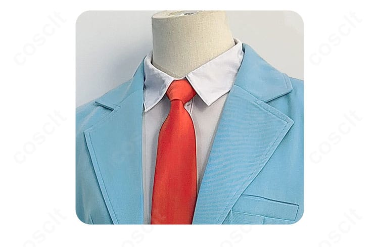 襟元の装飾ディテール。整った襟ラインとネクタイ結びの形状