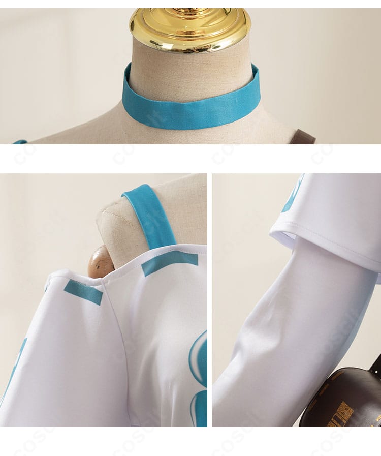 襟元と肩袖の刺繍・パイピング装飾のクローズアップ。精巧なステッチが見える。