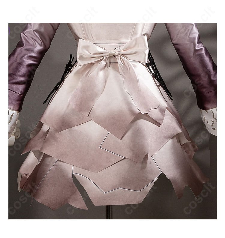 背面装飾の接写。蝶結びの縁取りと刺繍ディテール、質感が伝わるクローズアップ。