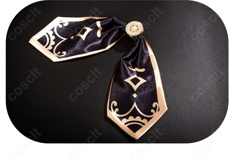 領結のクローズアップ。象徴的なデザインと中心パーツの仕上げを確認。