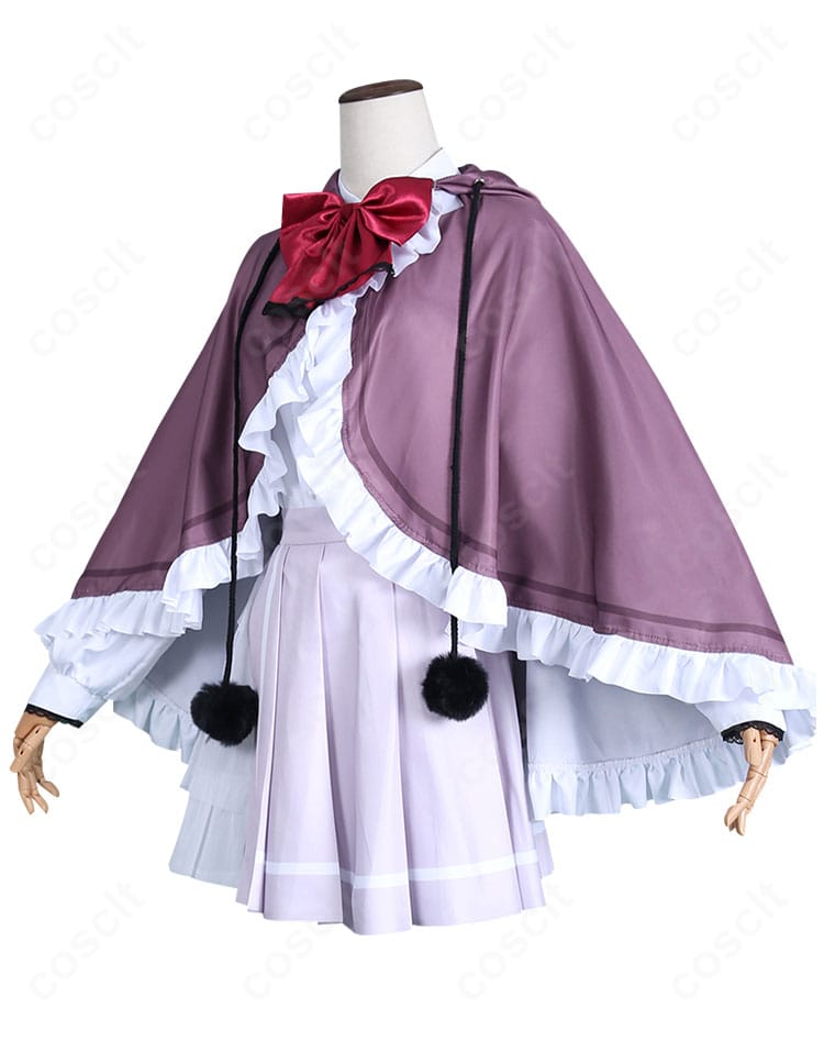 ねり衣装の左側面。胸元リボンとスカートのタック・裾ラインなどディテールが見えるカット。