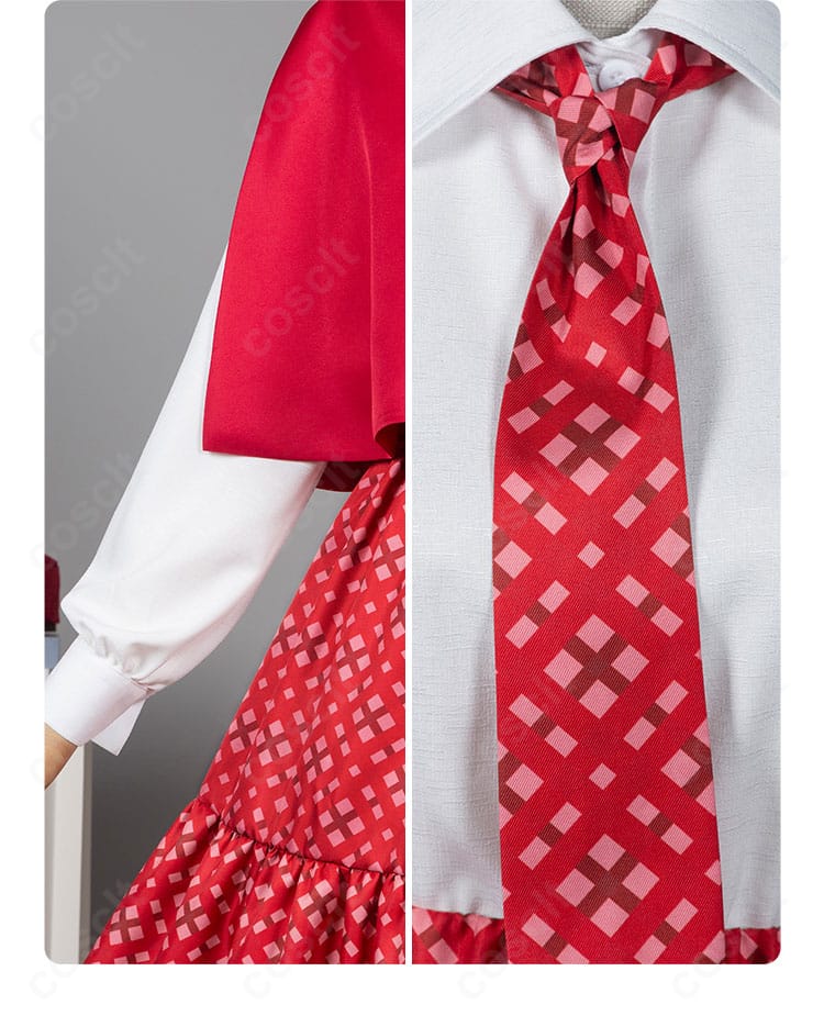 襟元のディテール。ボタン、装飾パーツ、ネクタイ結びの見え方など、清楚で整った印象を強調。