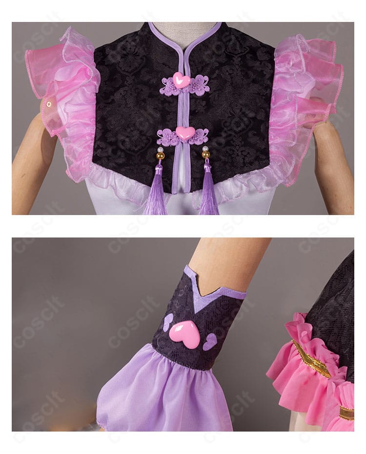 襟元と腕飾りのアップ。チャイナ調の襟デザインと細部装飾の丁寧な仕上げ。