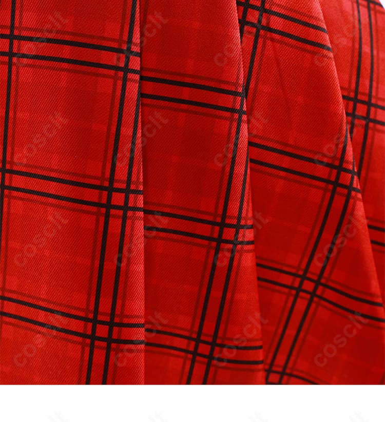 スカート裾の装飾ディテール。プリーツの揺れ感とステッチの整いを見せる接写。